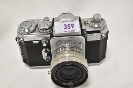 A Wirgin Edixa Reflex-C camera No216135 with Enna Munchen Lithagon 1:2,8 35mm lens