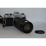 A Pentax K1000 camera No5385153 with Sigma High speed zoom 1:3,5-5,4 f80-200mm lens No505623 in soft