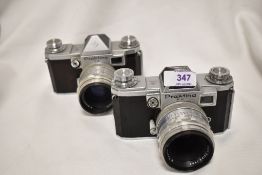 Two Praktina FX cameras one with Carl Zeiss Jena Blotar 1:2 58mm lens the othe Carl Zeiss Jena