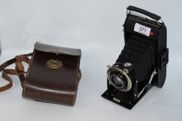A Voigtlander Bessa folding camera with an Anastigmat Voigtar 1:4,5 F=11cm lens in leather case