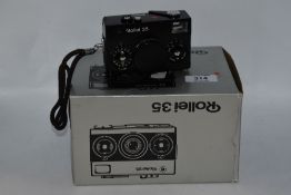 A Rollei 35 camera in original box