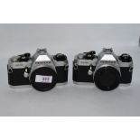 Two Pentax MG camera bodies Nos 7122588 & 7068651