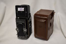 A Rolleimagic reflex camera No2518848 in leather case