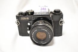A Ricoh XR-2 camera No32133938 with Rikenon 1:2 50mm lens