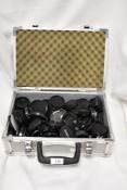 A flight case full of various lens cap