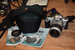 A Canon EOS300 camera No5165506 with Canon Zoom lens EF 28-90mm 1:4-5,6 in soft camera case with