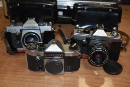 Three Praktica cameras. A Praktica Super TL body, a Praktica TL2 with Pentacon 1,8/50 lens and a