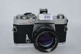 A Konica Autoreflex T3 camera No648730 with Konica Hexicon AR 1:4 57mm lens No7678174