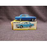A Dinky diecast, 160 Mercedes-Benz 250 SE in metallic blue with white interior, on original card