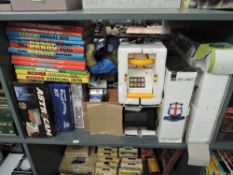 A shelf of mixed Toys and Games including Peter K Bot Robot, Estes Astrocam Rocket, Roller Coaster