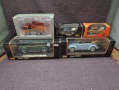 A Volvo Motorart 1:50 scale diecast, Volvo FM9 Construction Truck along with Ixo and Replicars Volvo