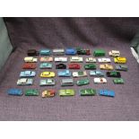 A collection of 33 Matchbox Lesney, Moko Lesney playworn diecasts including Saloon Cars, Advertising
