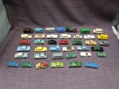 A collection of 33 Matchbox Lesney, Moko Lesney playworn diecasts including Saloon Cars, Advertising