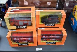 Nine modern Husky diecasts, TY87401 Tour Bus x7, TY83901 Black Taxi and TY87101 Fire Engine, all