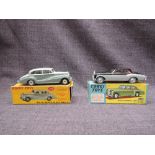 A Corgi diecast, 224 Bentley Continental Sports Saloon, two tone black and silver with red interior,