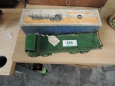 A Dinky diecast, 505 Foden Flat Truck with chains, in green with black tyres, in original box