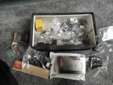 A box of Hornby and similar 0 gauge Spare Parts and Accessories along with Clockwork Keys