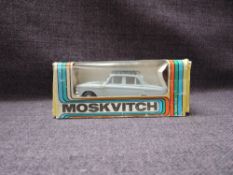 A Moskvitch 1:43 scale diecast, Touring Car in grey with white interior and back roof rack, in