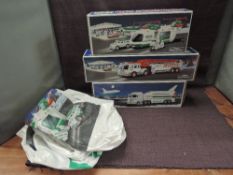 Three Hess models, Helicopter with Motorcycle and Cruiser, Toy Truck and Space Shuttle with