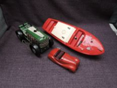 A Schuco Examico 4001 clockwork and tin plate car with key, Triang plastic model Cruiser Boat and