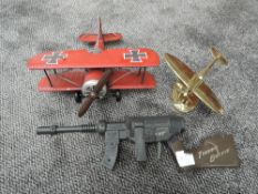 A reproduction tin plate German Bi-Plane, modern brass model of a Fighter Plane and a Ever Onward,