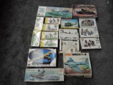 Seventeen mixed scale plastic Military Kits including Matchbox Boeing B-17G, Heller German Soldiers,