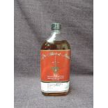A bottle of Adhainn Dearg The Spirit of Lewis Single Malt Spirit, cask number 032010, distilled 10/