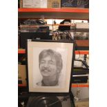 A framed and mounted Beatles / John Lennon pencil sketch print by Chris Burns measuring 47cm by