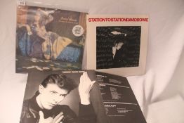 A lot of Bowie albums with relevant inners - classic stuff and a wonderful collection of some of his