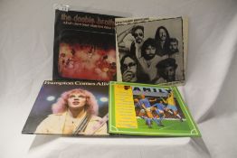 A mixed lot of ten vinyl albums - viewing recommended -Doobie Brothers and Family are some of the