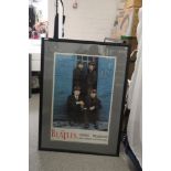 A large framed Beatles print measuring 85cm x 114 cm ' London Palladium '