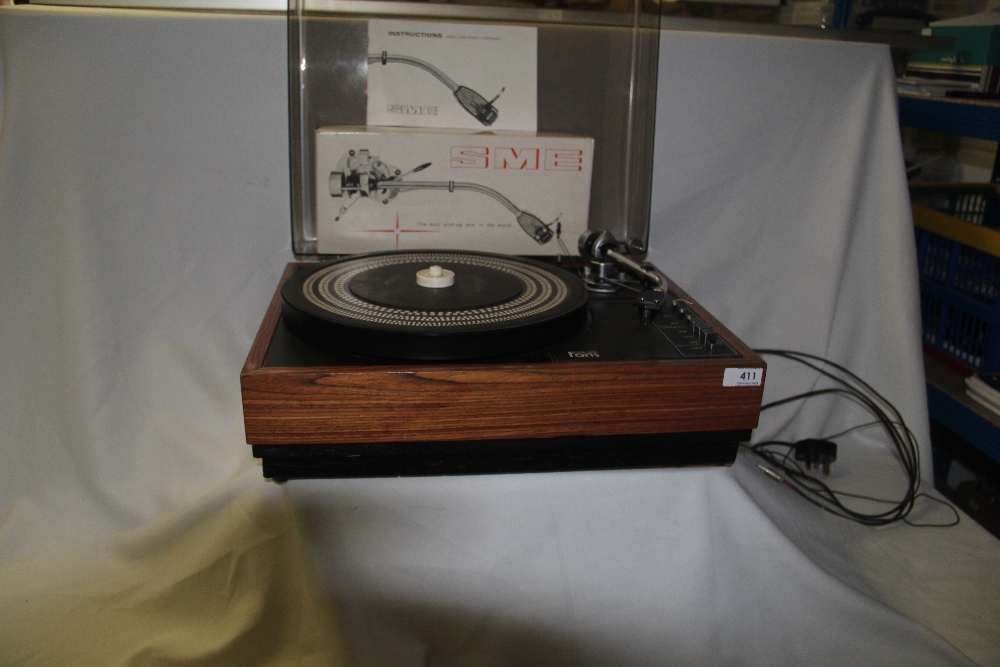 A vintage and high end British turntable from Fons - with an SME arm and dust cover - been