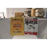 A small lot of Beatles tin sign - five in total with the largest four measuring 30 x 35 cm -