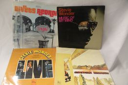 A lot of ten Stevie Wonder albums covering his early soul years going through to his more funky