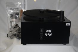 A deep vinyl cleaner by Okki Nokki that has been used no more than half a dozen times - is as new