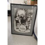 A large framed Beatles print measuring 85cm x 114 cm