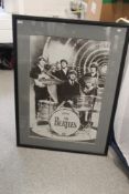 A large framed Beatles print measuring 85cm x 114 cm