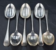 A group of six George V silver Old English pattern table spoons, with pip reverse and engraved