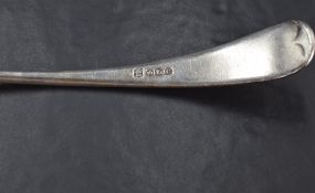 A George V silver Old English pattern ladle, with pip reverse and engraved with initial O, marks for