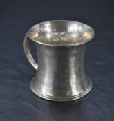 A George V silver mug, of flared cylindrical form with bands of engine-turned decoration and