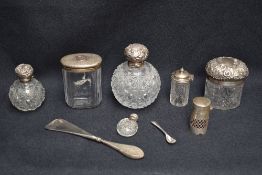 A late Victorian silver-topped hob-nail cut-glass dressing table jar, of oval form with domed cover,