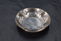 An interesting 900 grade white metal pin dish, the rim embossed with stylised rams head and axe