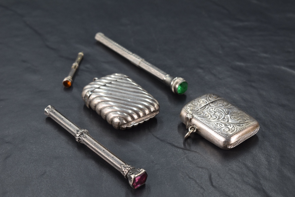 A late Victorian silver vesta case, of hinged rectangular form with angled reeded decoration