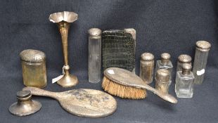 A group of mixed silver topped and mounted dressing table items, to include seven matching