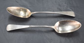 A pair of George IV silver Old English pattern table spoons, engraved with initial P with pip