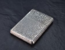 A Queen Elizabeth II silver cigarette or card case, of rounded rectangular form with textured