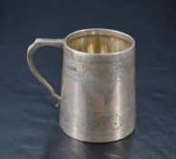 A Victorian silver christening mug, of spreading cylindrical form with bands of wriggle work and