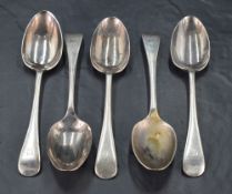 A group of five George V silver Old English pattern dessert spoons, with pip reverse and engraved