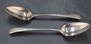 A pair of George III silver Old English pattern table spoons, engraved with initials BEC with pip