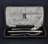 A George V cased silver christening set, comprising an Old English pattern knife, fork and spoon